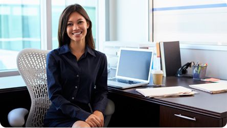 Customer service representative at her desk